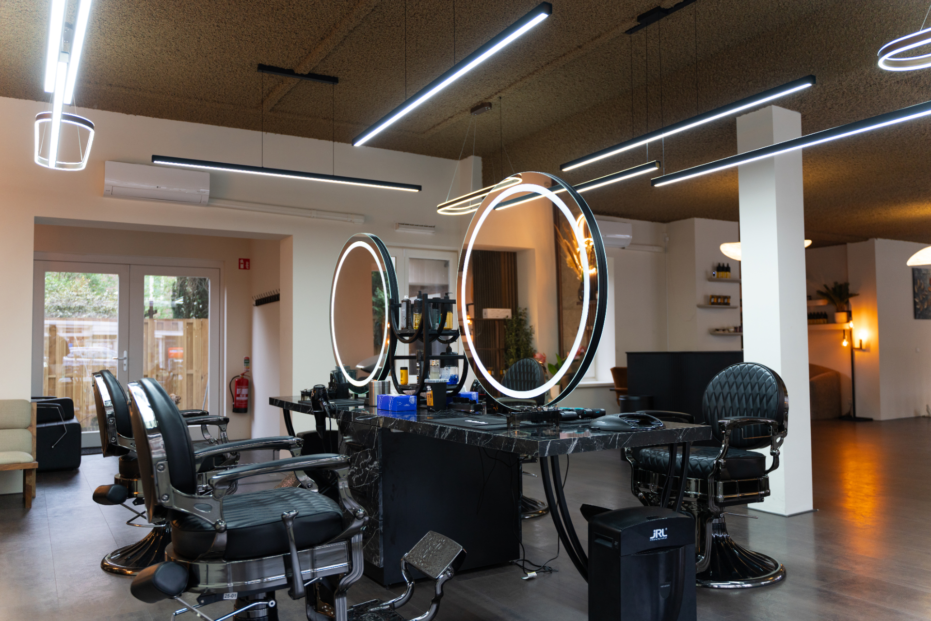 Detailed scissor work and styling at Icon Barbershop Stadionbuurt