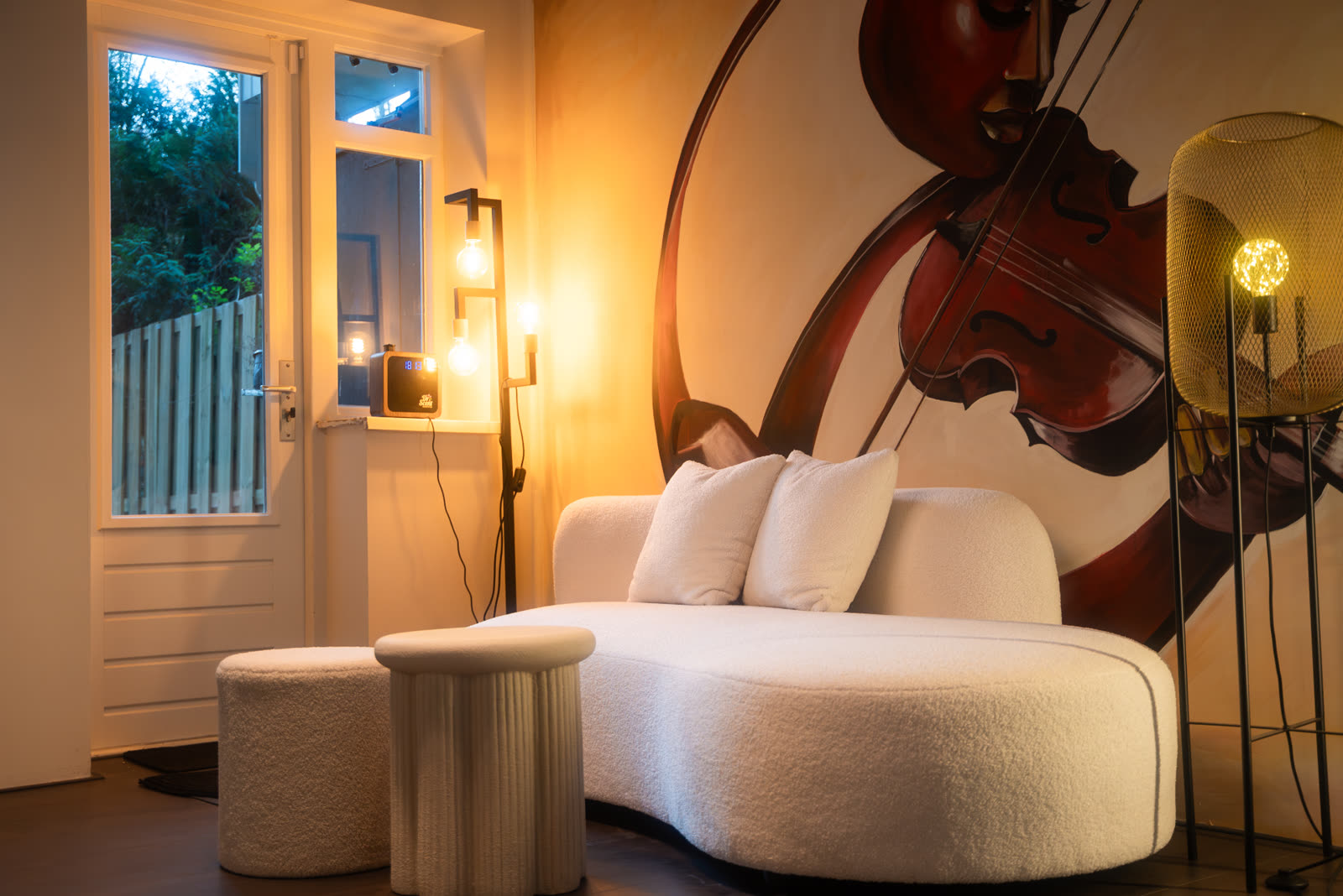 Sofa lounge with violin mural